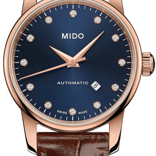 Die kleine Baroncelli Midnight Blue von Mido mit Diamantindizes und 29 Millimeter Durchmesser. Die kleine Baroncelli Midnight Blue von Mido mit Diamantindizes und 29 Millimeter Durchmesser.