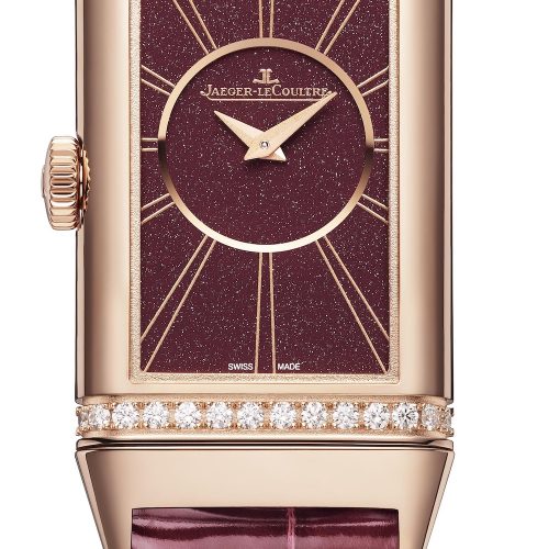 Die Rückseite der Reverso One Duetto von Jaeger-LeCoultre in Rotgold mit rotem Blatt am Alligatorband. Die Rückseite der Reverso One Duetto von Jaeger-LeCoultre in Rotgold mit rotem Blatt am Alligatorband.