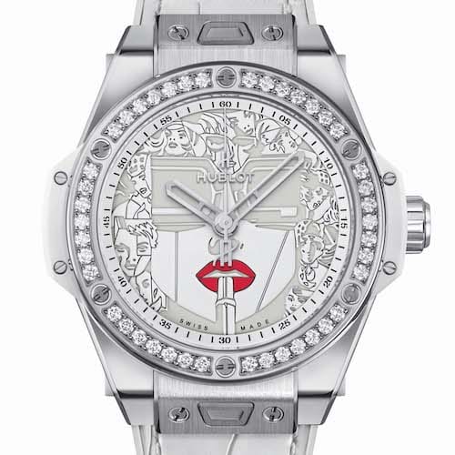 Die Big Bang Lipstick in Edelstahl mit weißem Alligatorlederband. Die Big Bang Lipstick in Edelstahl mit weißem Alligatorlederband.