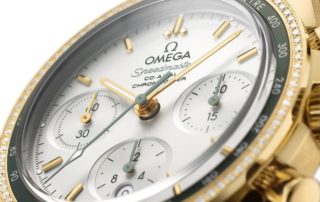 Omega Speedmaster 18K Gold Grüne Diamantlünette