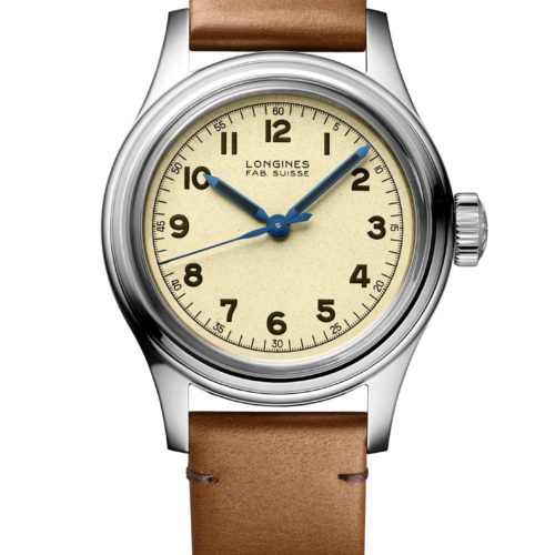 Longines-Heritage-Military-Marine-Nationale-L2.833.4.93.2-Front Das opalin goldfarbene Zifferblatt mit arabischen Ziffern ist leicht gekörnt.