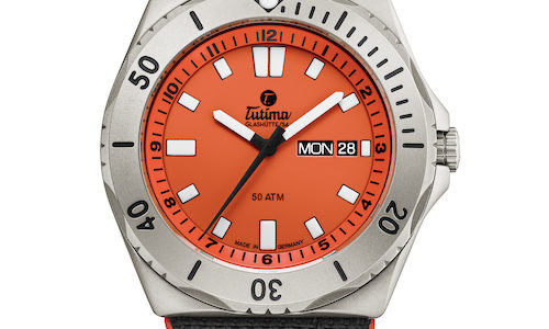 Die Tutima M2 Seven Seas mit orangefarbenem Zifferblatt und Kevlarband. Die Tutima M2 Seven Seas mit orangefarbenem Zifferblatt und Kevlarband.