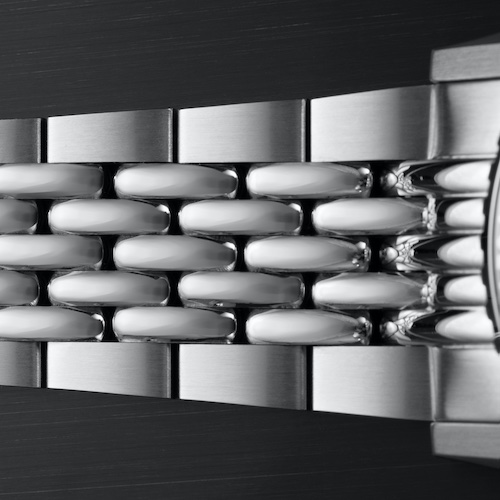 Nivada Grenchen Chronomaster Big Eye C6A0048 Band Das Band aus Edelstahl 316L im Reiskorn-Muster ist siebenreihig.