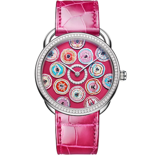 Hermés Arceau Belles du Mexique Himbeerrot Die sieben Figuren im inneren Kreis sind beweglich gelagert.