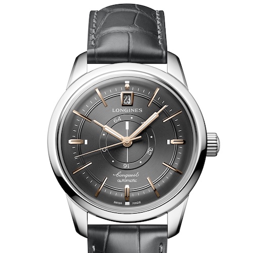 Longines Conquest Heritage Central Power Reserve Anthrazit Zum anthrzitfarbenen Zifferblatt passen rot vergoldete Zeiger und Indizes.