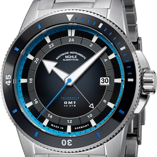 Sportivo Travel GMT M1-52-13 Metallband Der Pfeilzeiger signalisiert die zweite Zeitzone auf dem erhabenen Ring auf dem Zifferblatt.