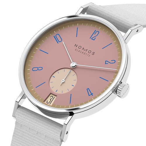 Nomos Glashütte 15 Tangente 38 Datum Pompadour Die Kombination des antiken Rosatons mit einem Ring aus Dunkelgold und der royalblauen Typografie flirtet mit der Mätresse des Adels.