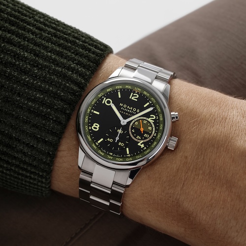 Nomos Club Sport Neomatik Weltzeit Night Vision Vector Das Modell Vector der Nomos Club Sport Neomatik Weltzeit Night Vision.