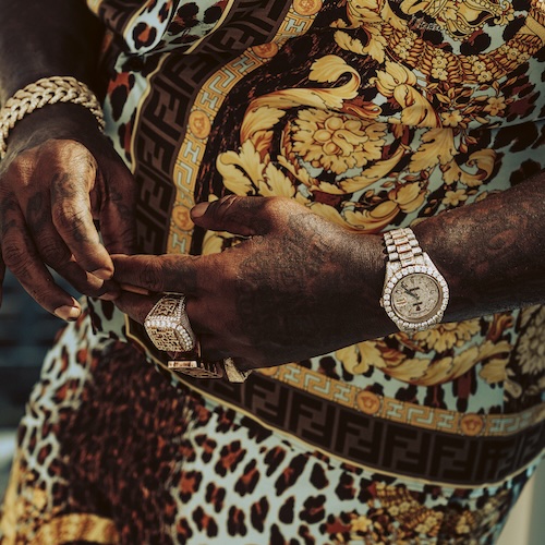Rick Ross mit Rolex Day-Date Rick Ross mit seiner Rolex Day-Date vertritt den »Luxury«-Rap.